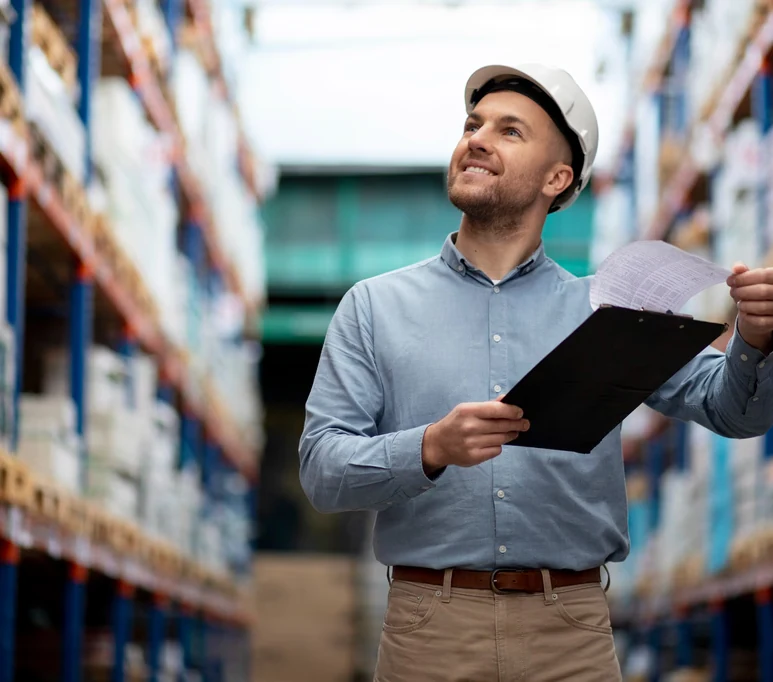 Warehouse supervisor checking a consignment